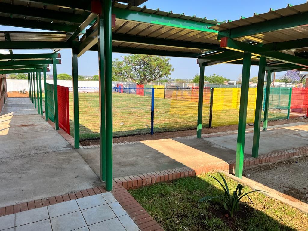Covered walkway and fencing